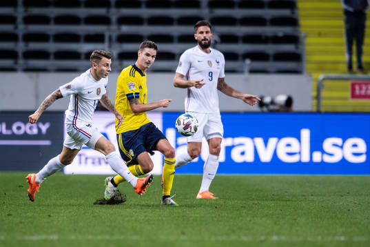 Adrien Rabiot and Olivier Giroud of France against Mikael