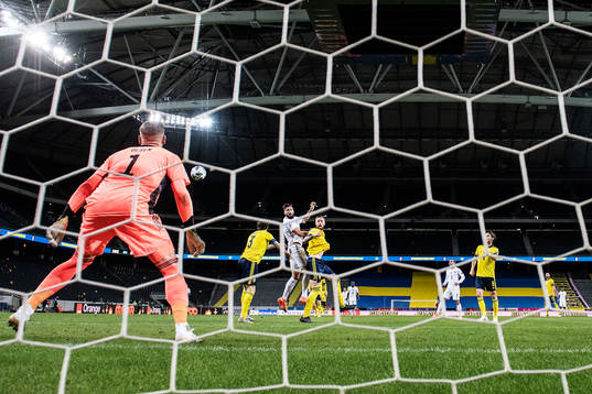 Olivier Giroud of France and Pontus Jansson of Sweden
