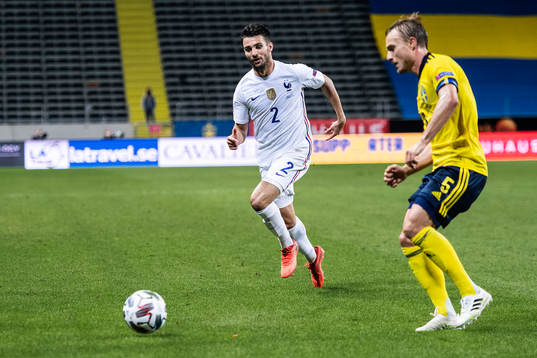 Léo Dubois of France and Pierre Bengtsson of Sweden