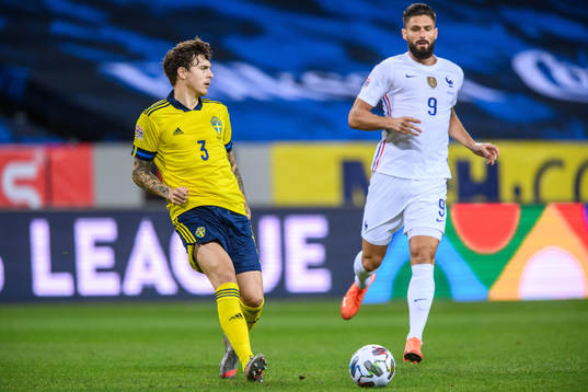 Victor Nilsson Lindelöf of Sweden and Olivier Giroud of