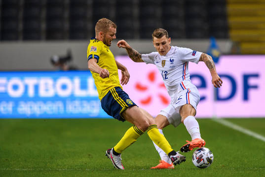 Sebastian Larsson of Sweden and Lucas Digne of France