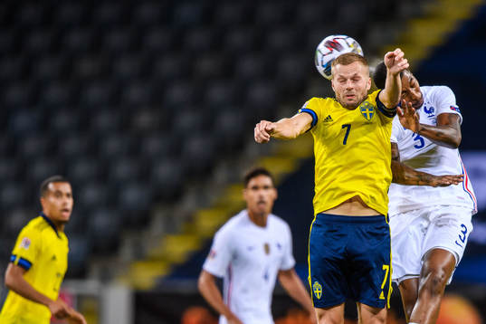 Sebastian Larsson of Sweden and Presnel Kimpembe of France