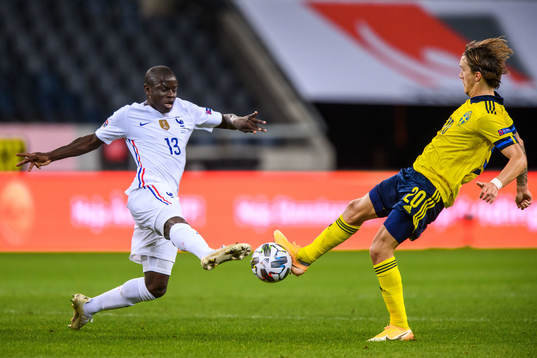 N'Golo Kanté of France and Kristoffer Olsson of Sweden