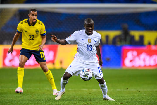 Robin Quaison of Sweden and N'Golo Kanté of France