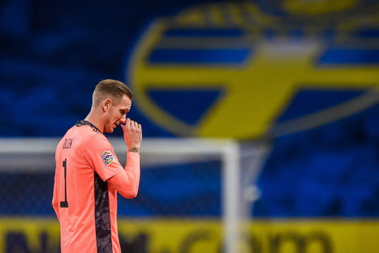 Goalkeeper Robin Olsen of Sweden looks dejected