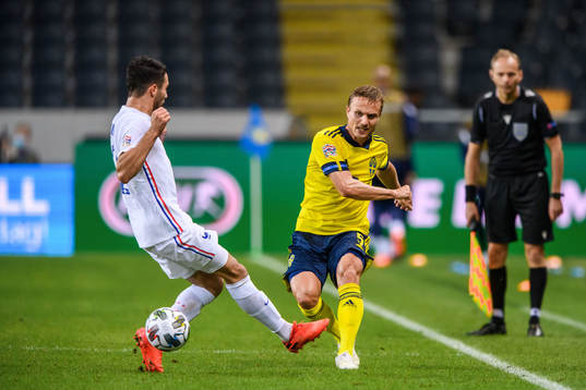 Léo Dubois of France and Pierre Bengtsson of Sweden