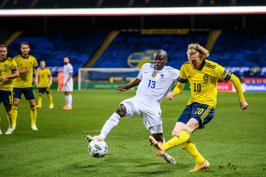 N'Golo Kanté of France and Emil Forsberg of Sweden