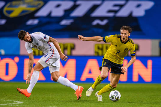 Olivier Giroud of France and Albin Ekdal of Sweden