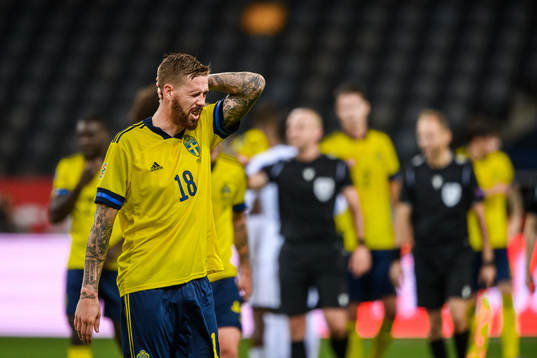 Pontus Jansson of Sweden looks dejected