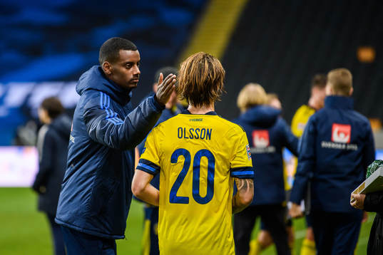 Alexander Isak and Kristoffer Olsson of Sweden looks