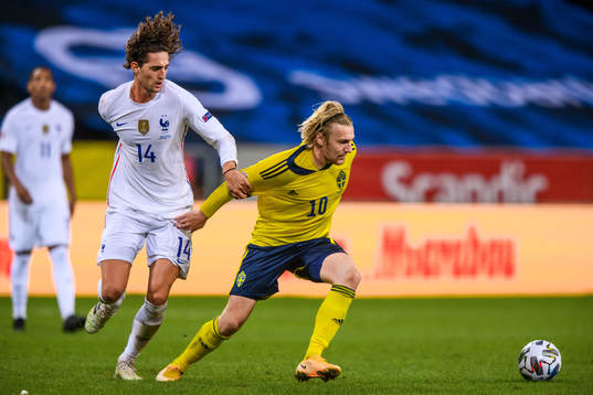 Adrien Rabiot of France and Emil Forsberg of Sweden