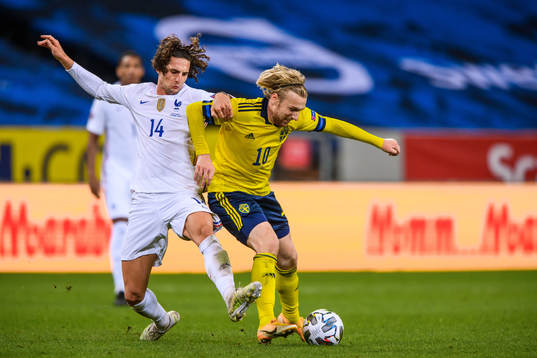 Adrien Rabiot of France and Emil Forsberg of Sweden