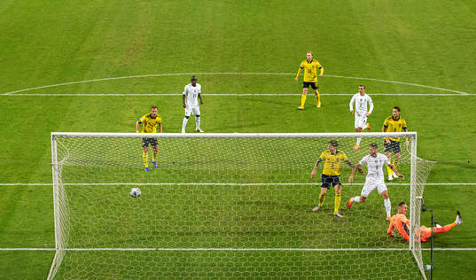 Goalkeeper Robin Olsen of Sweden lets in the 0-1 goal from