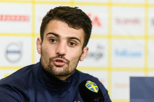 Léo Dubois of France at a press conference