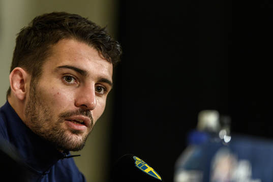 Léo Dubois of France at a press conference