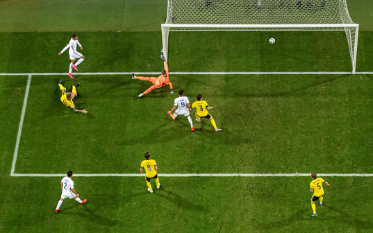 Kylian Mbappé of France scores 0-1 behind goalkeeper Robin