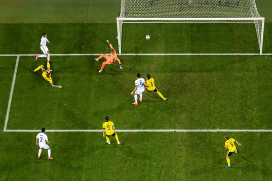 Kylian Mbappé of France scores 0-1 behind goalkeeper Robin