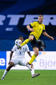 Presnel Kimpembe of France and Sebastian Larsson of Sweden