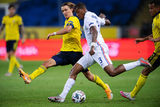 Kristoffer Olsson of Sweden and Presnel Kimpembe of France