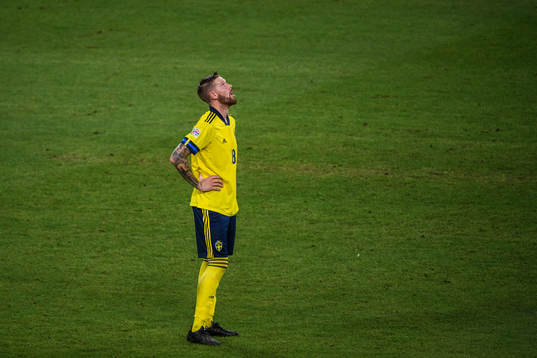 Pontus Jansson of Sweden looks dejected