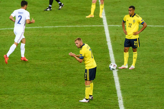 Sebastian Larsson of Sweden looks dejected