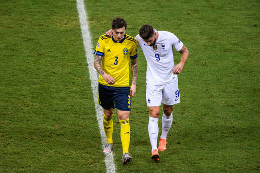 Victor Nilsson Lindelöf of Sweden and Olivier Giroud of