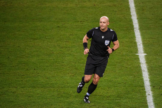 Referee Szymon Marciniak