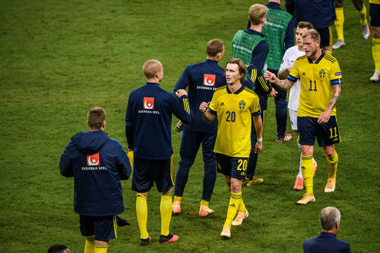 Kristoffer Olsson and John Guidetti of Sweden looks dejected