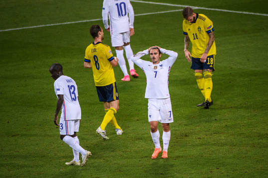 Antoine Griezmann of France looks dejected