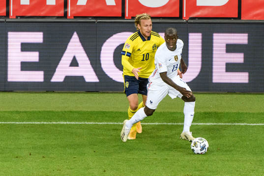 Emil Forsberg of Sweden and N'Golo Kanté of France