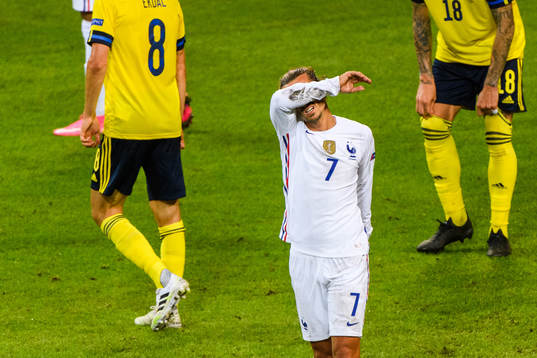 Antoine Griezmann of France looks dejected