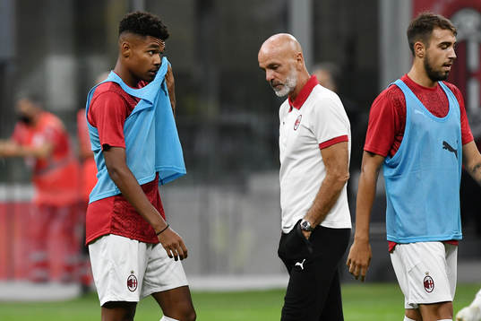 Emil Roback and coach Stefano Pioli of Milan