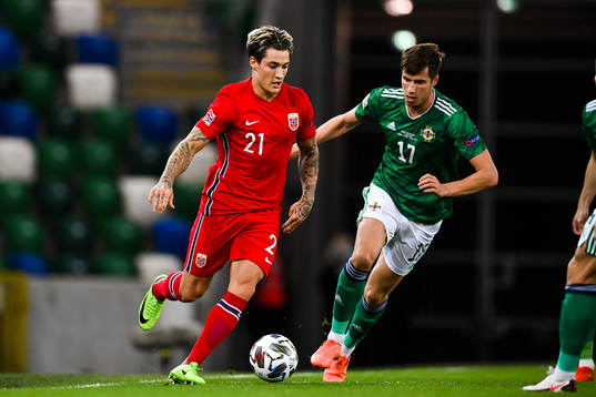 Mathias Normann of Norway and Paddy McNair of Northern