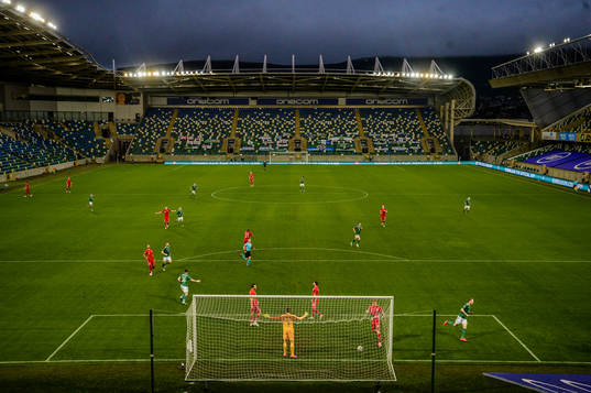 Paddy McNair of Northern Ireland scores the 1-1 goal behind