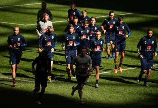 Players of the Swedish national football team warm up