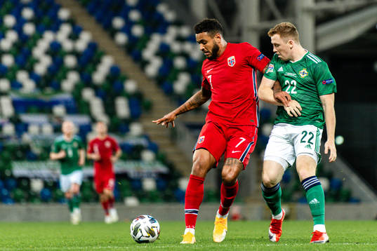 Joshua King of Norway and Shayne Lavery of Northern Ireland