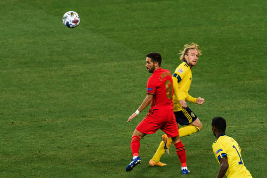 Joao Moutinho of Portugal and Emil Forsberg of Sweden
