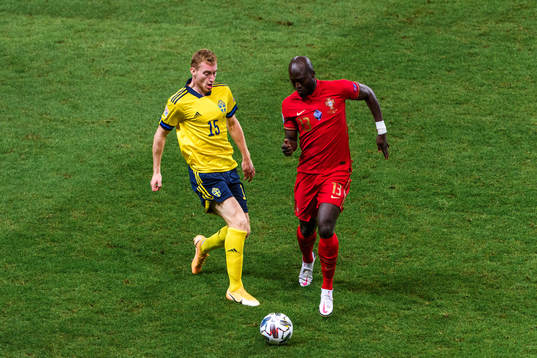 Dejan Kulusevski of Sweden and Danilo Ferreira of Portugal