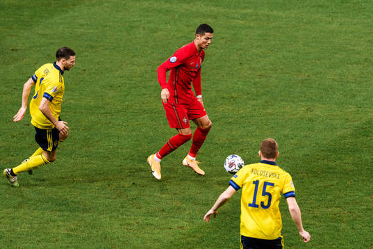 Cristiano Ronaldo of Portugal against Marcus Berg and Dejan