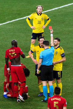 Gustav Svensson of Sweden receives a red card
