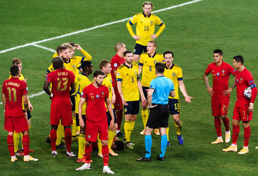 Gustav Svensson of Sweden receives his second yellow card