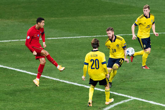 Cristiano Ronaldo of Portugal scores the 0-2 goal behind