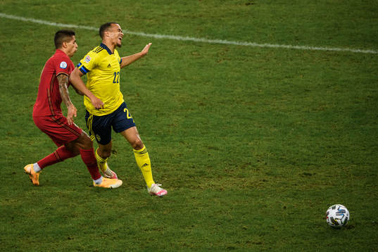 Joao Cancelo of Portugal and Robin Quaison of Sweden