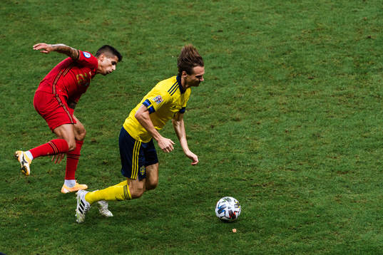 Joao Cancelo of Portugal and Albin Ekdal of Sweden