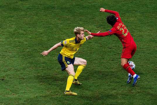 Filip Helander of Sweden and Joao Felix of Portugal