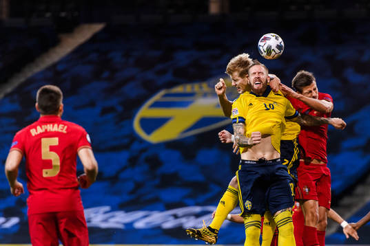 Filip Helander and Pontus Jansson of Sweden against Ruben