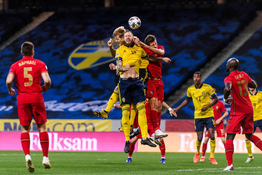 Filip Helander and Pontus Jansson of Sweden against Ruben