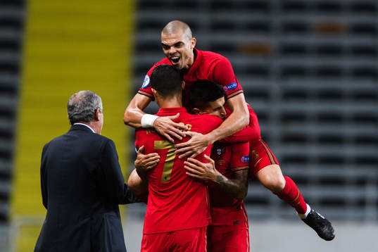 Cristiano Ronaldo and Pepe of Portugal celebrate the 0-1