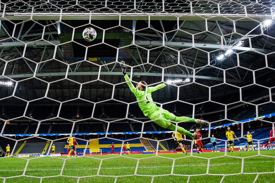 Cristiano Ronaldo of Portugal scores 0-2 behind goalkeeper