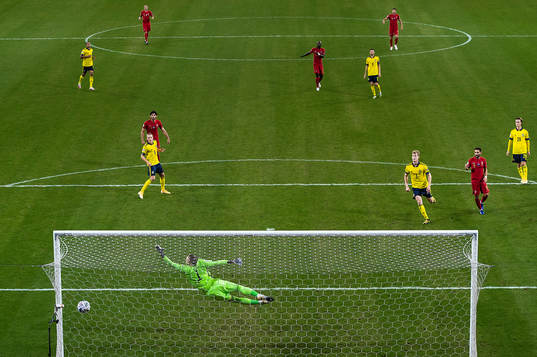 Cristiano Ronaldo of Portugal scores 0-2 behind goalkeeper